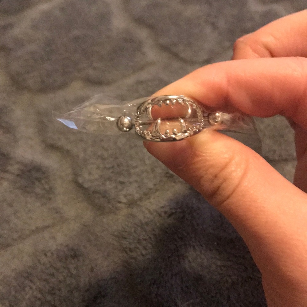 Two pairs of nipple rings